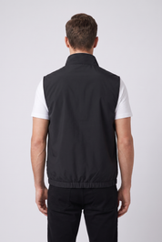 Gilet sans manches noir MONVALERE vu de dos : coupe arriere, col montant et ourlet elastique